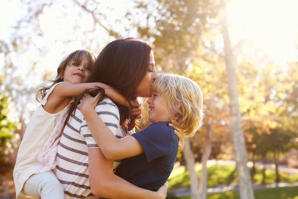 A mom and her two kids.